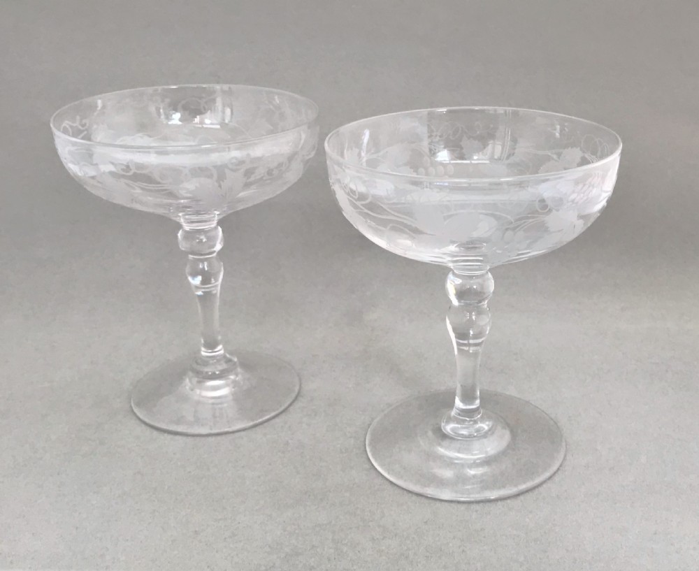 A gorgeous pair of Victorian etched champagne glasses