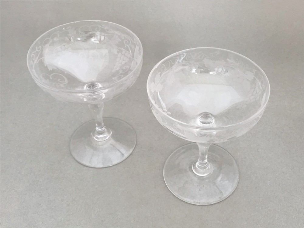 A gorgeous pair of Victorian etched champagne glasses View II