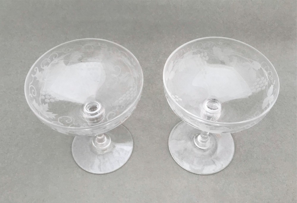 A gorgeous pair of Victorian etched champagne glasses View V