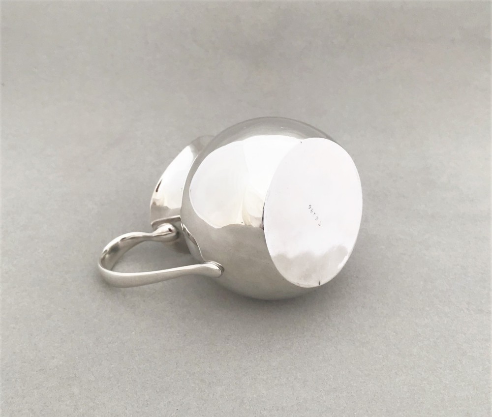 A stylish small Edwardian silver cream jug View V