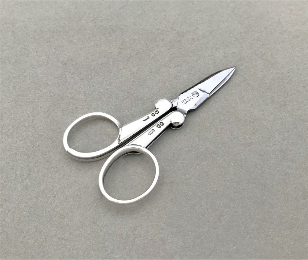 A rare pair of Victorian silver folding Campaign scissors View II