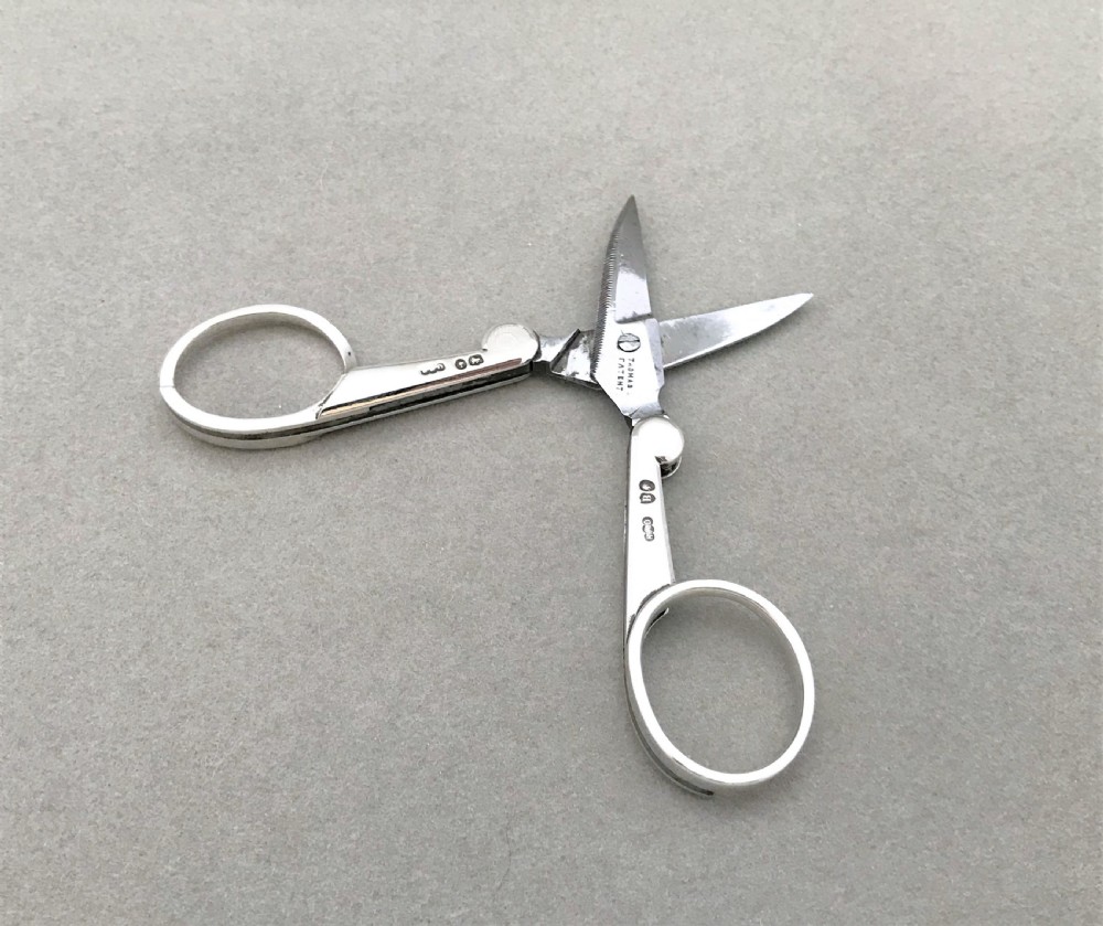 A rare pair of Victorian silver folding Campaign scissors View III