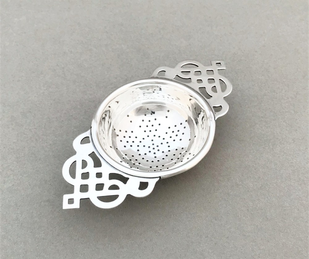 A gorgeous Art Deco silver tea strainer View III