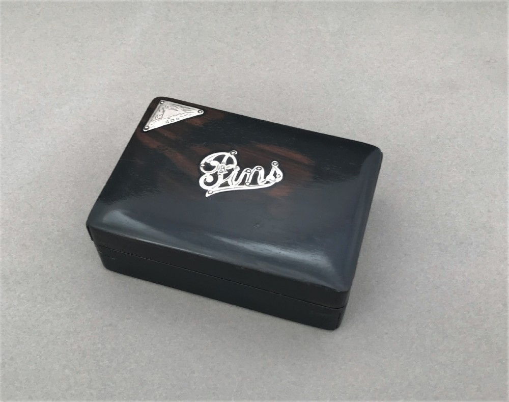 A charming silver mounted ebony 'Pins' box