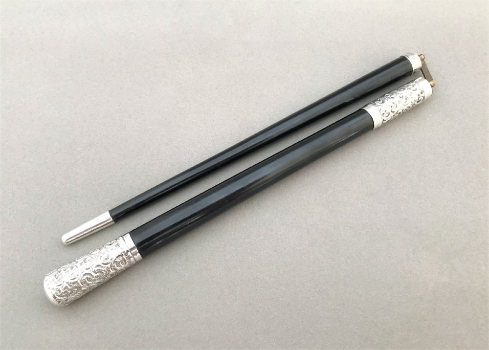 A fabulous silver & ebony Conductor's baton View IV