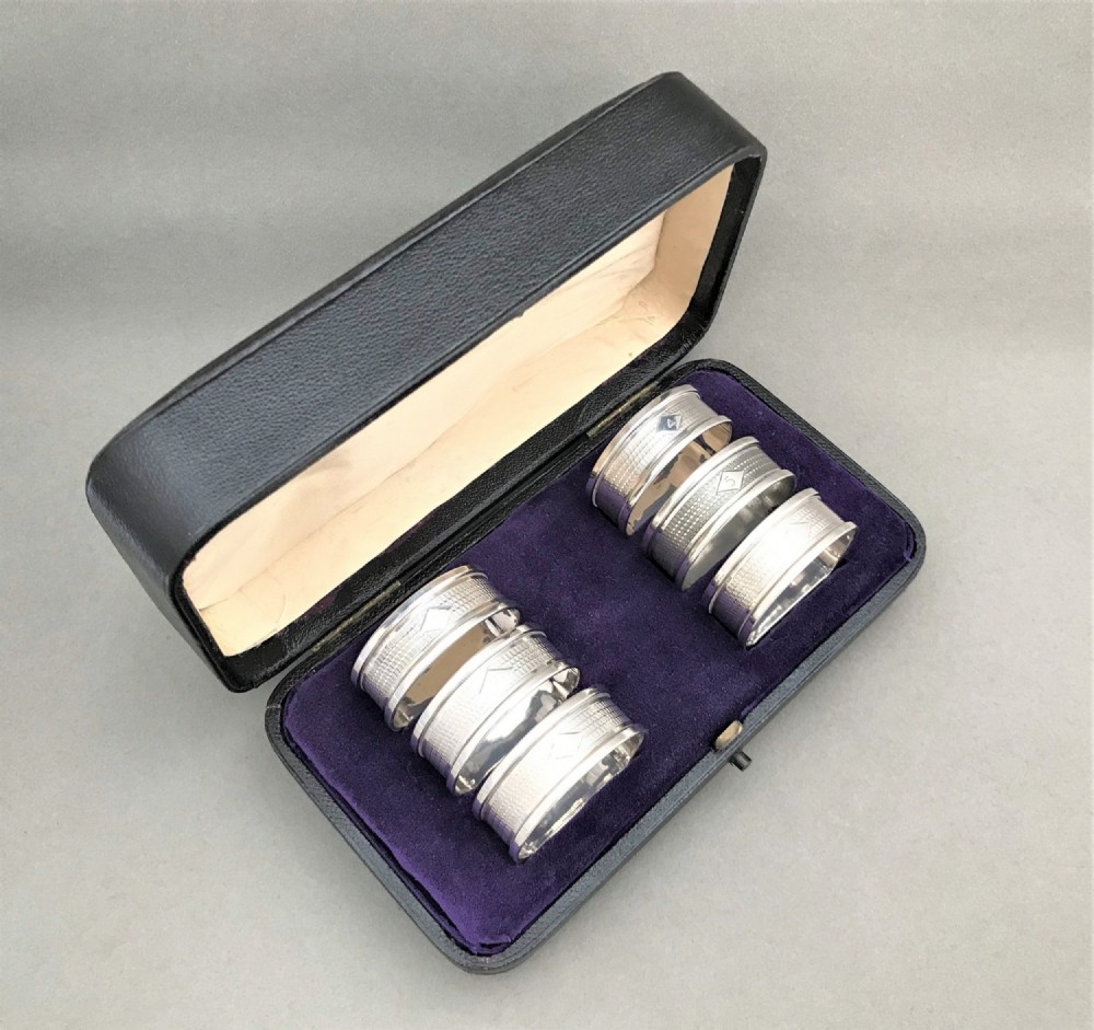 A Superb Set Of Six Boxed Silver Napkin Rings