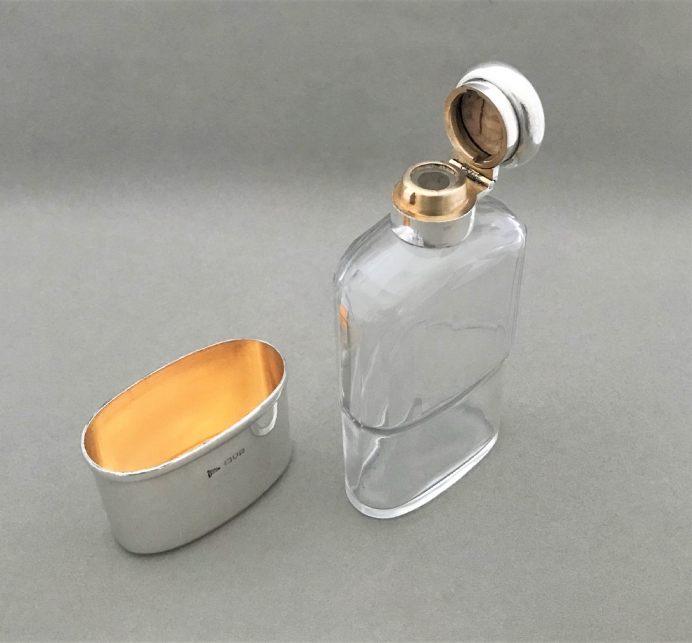 A handsome George V silver & glass hip flask View IV