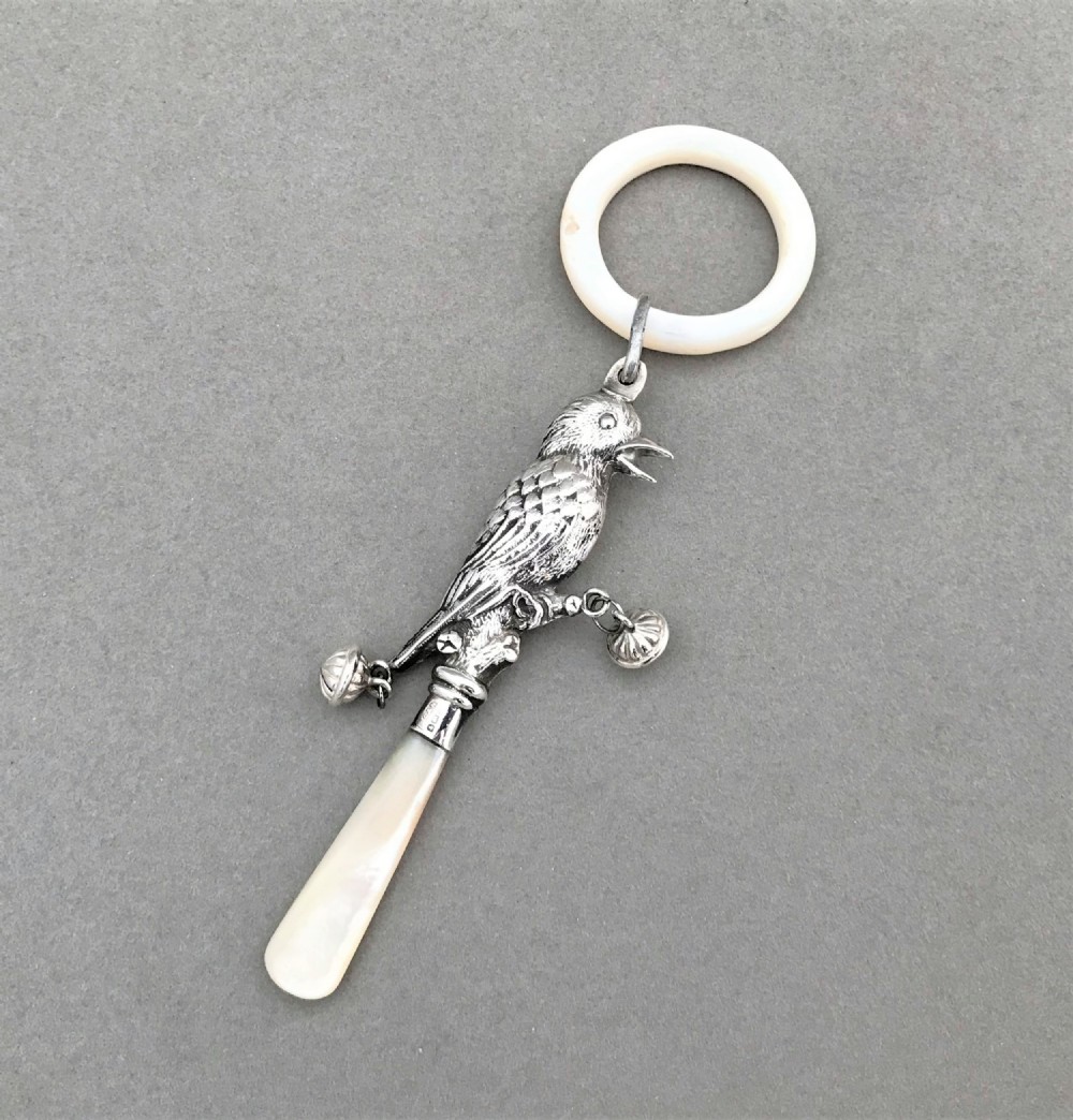 An unusual silver & mother-of-pearl Starling rattle
