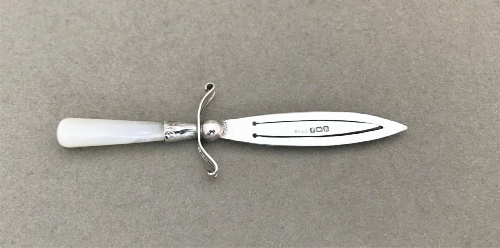 A delightful silver & mother-of pearl dagger bookmark View II