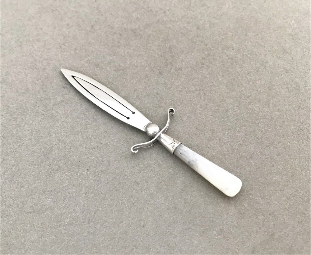 A delightful silver & mother-of pearl dagger bookmark View III