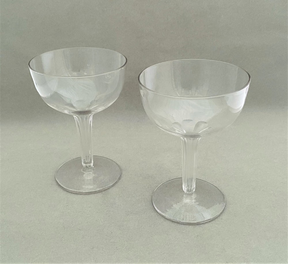 A sought after pair of hollow stem champagne glasses
