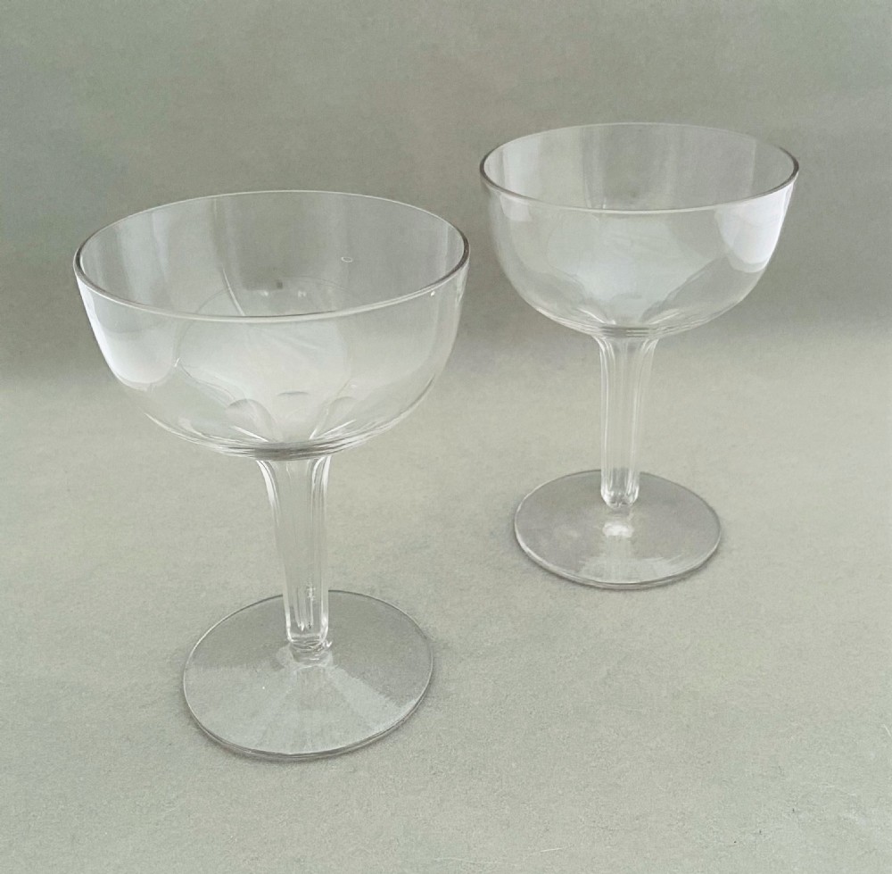 A sought after pair of hollow stem champagne glasses View III