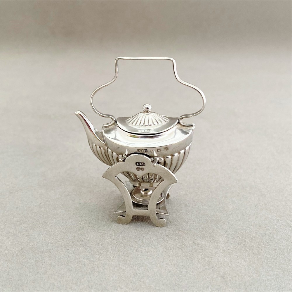 A superb Edwardian miniature spirit kettle