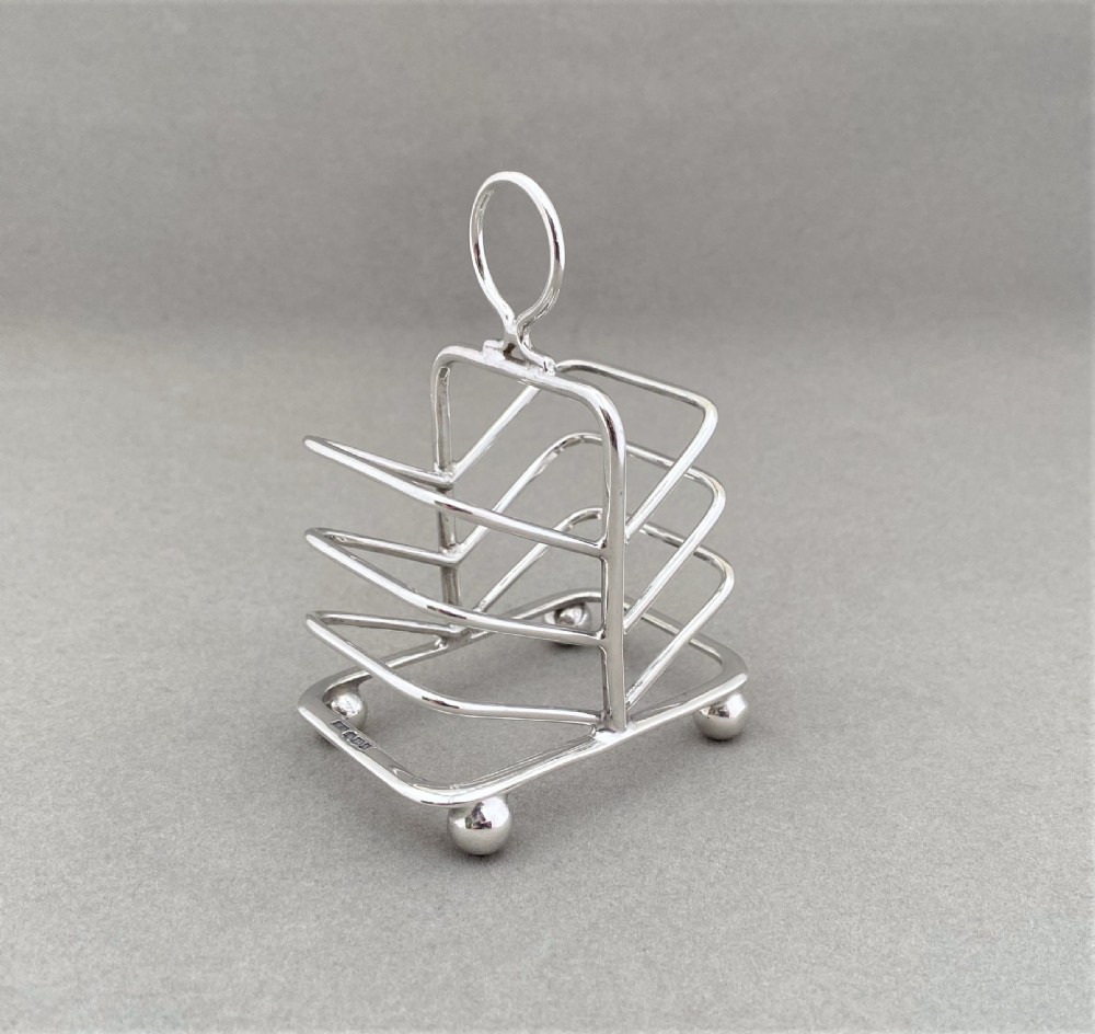 A lovely novelty silver breakfast tray toast rack View III