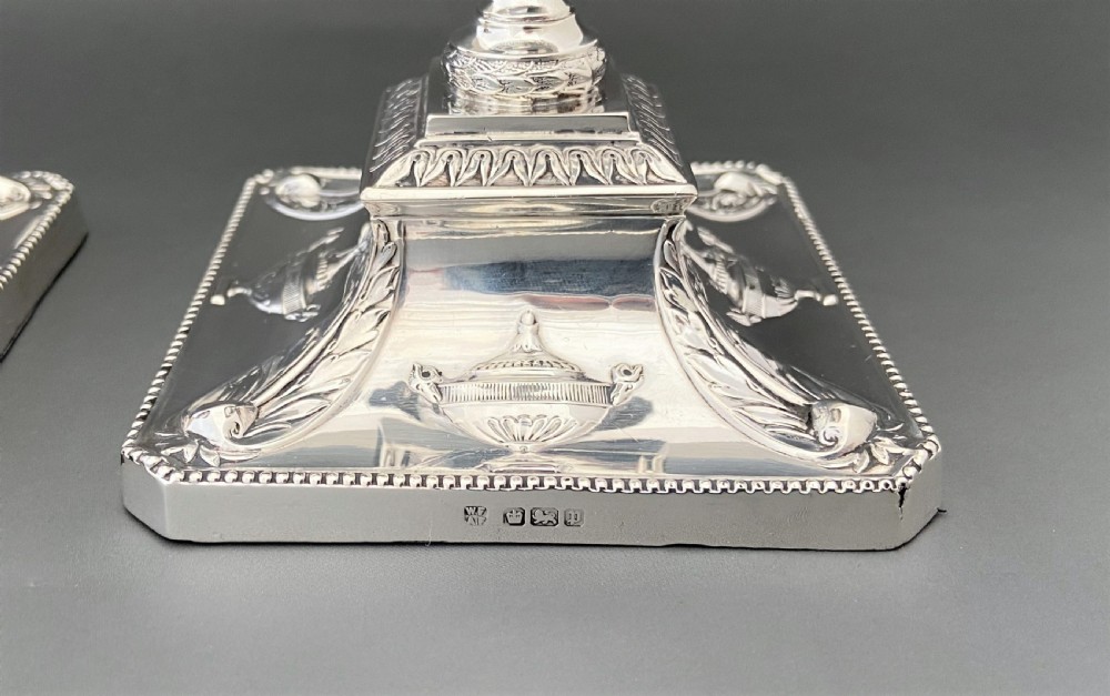 A superb pair of Edwardian silver candlesticks View VII