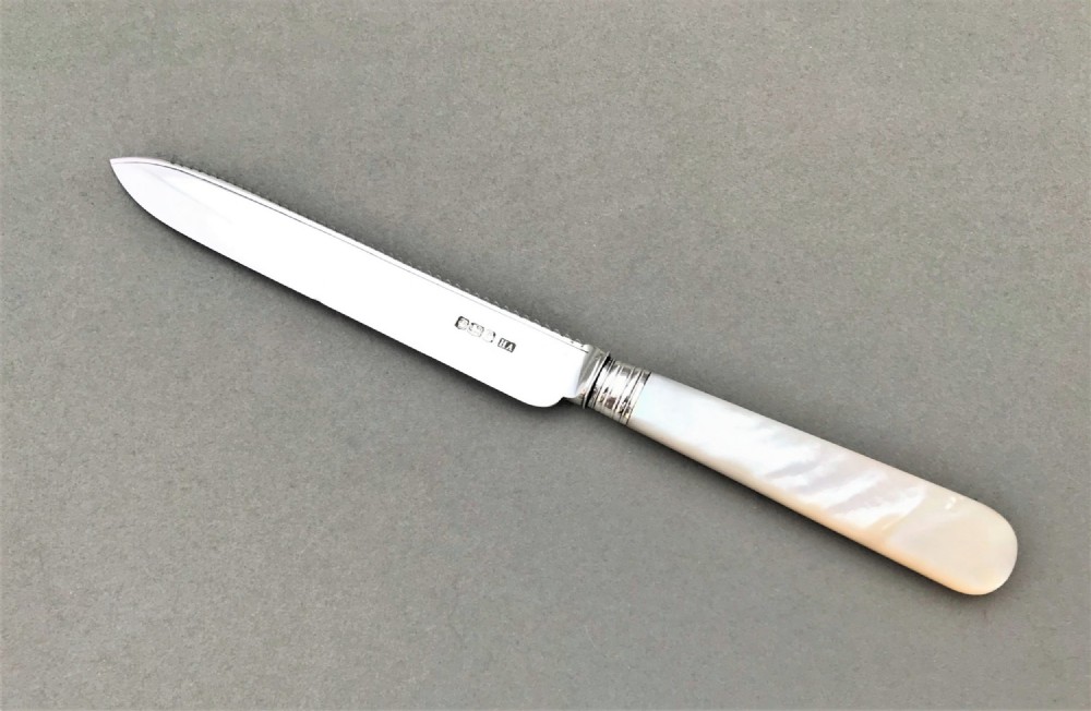 An Elegant Silver Bladed Cake Knife