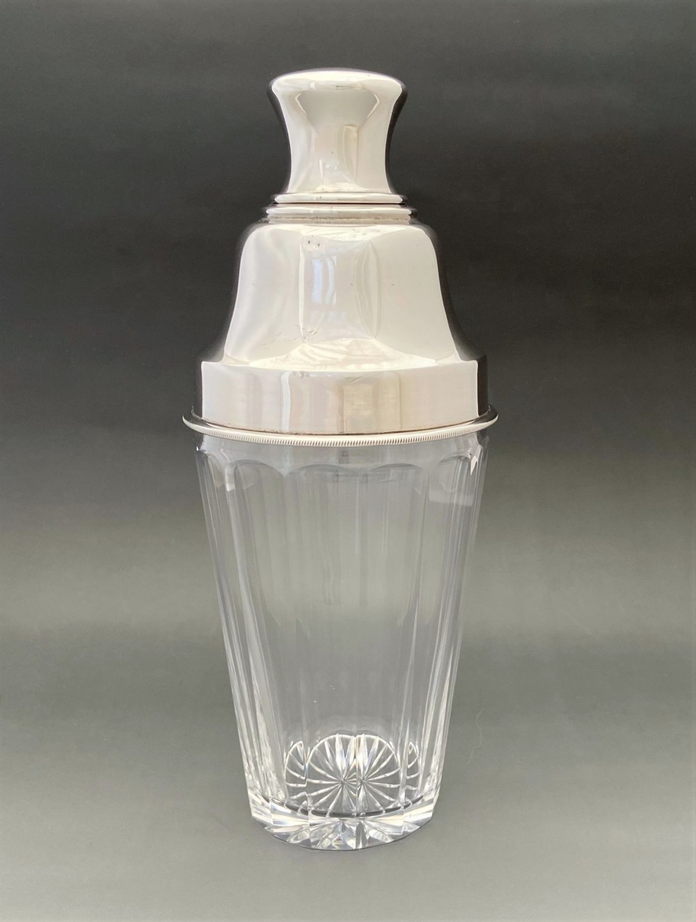 A handsome silver plated & cut glass cocktail shaker