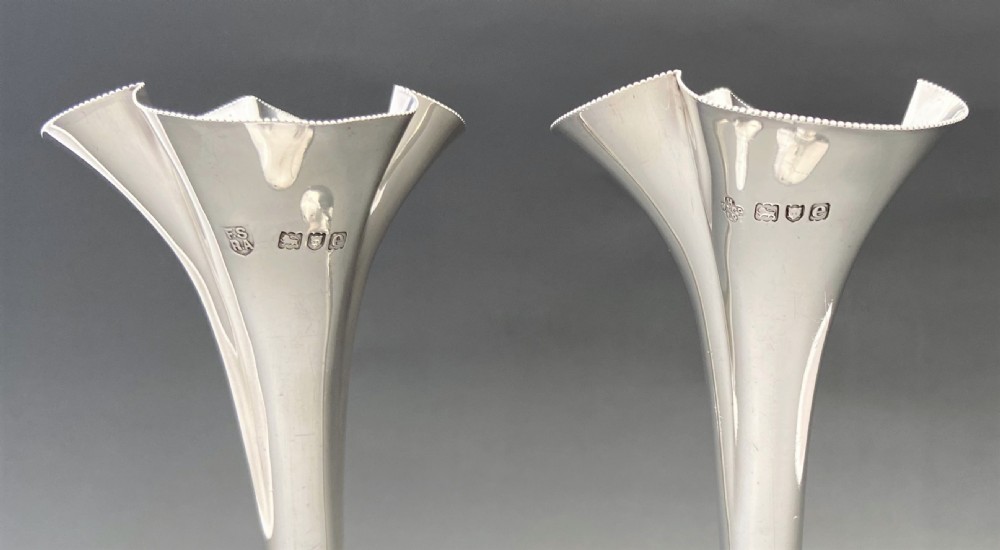 A superb pair of late Victorian silver stem vases View V