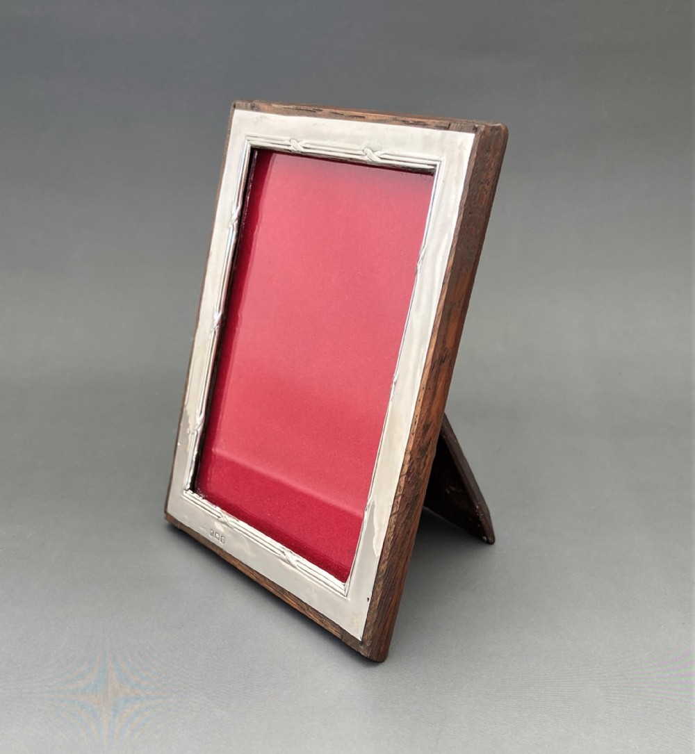 A George V silver & oak easel back photo frame
