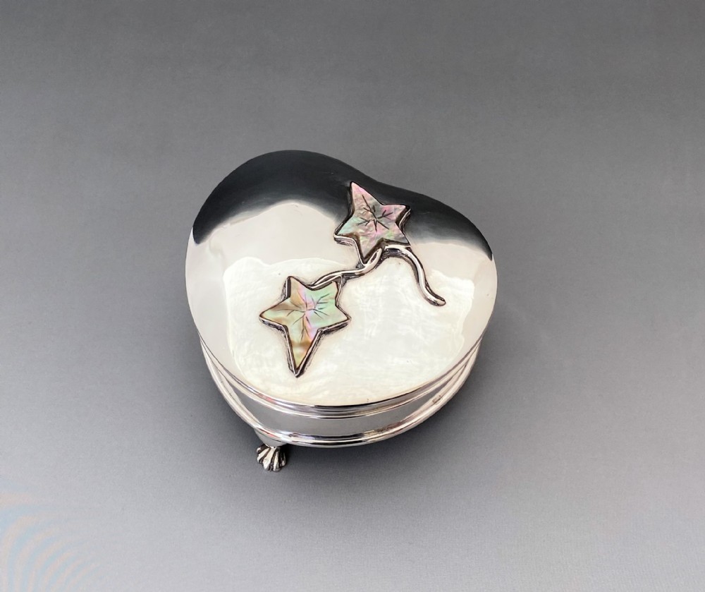 A superb Edwardian heart shaped silver & mother-of-pearl trinket box