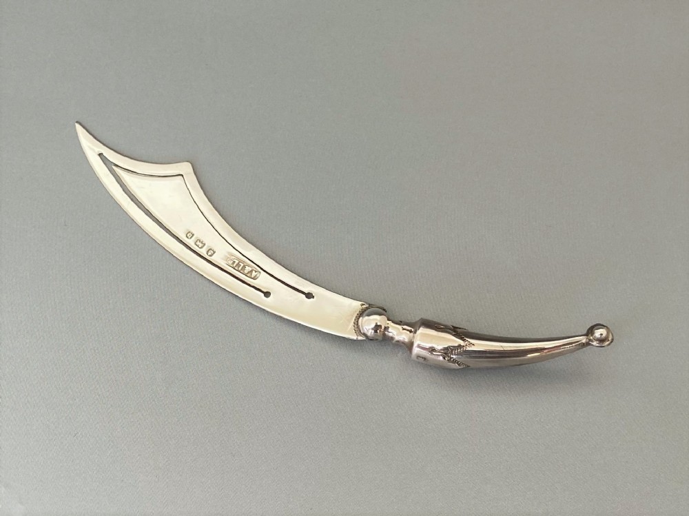 A rare Edwardian silver novelty cutlass bookmark