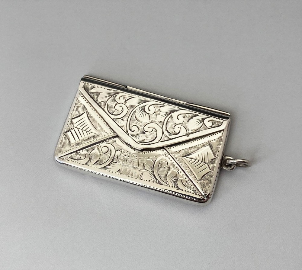 An Edwardian Chester silver double stamp envelope