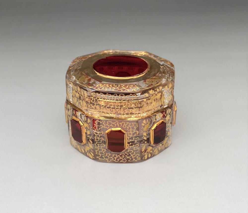 An exquisite Moser cut glass & gilded trinket pot