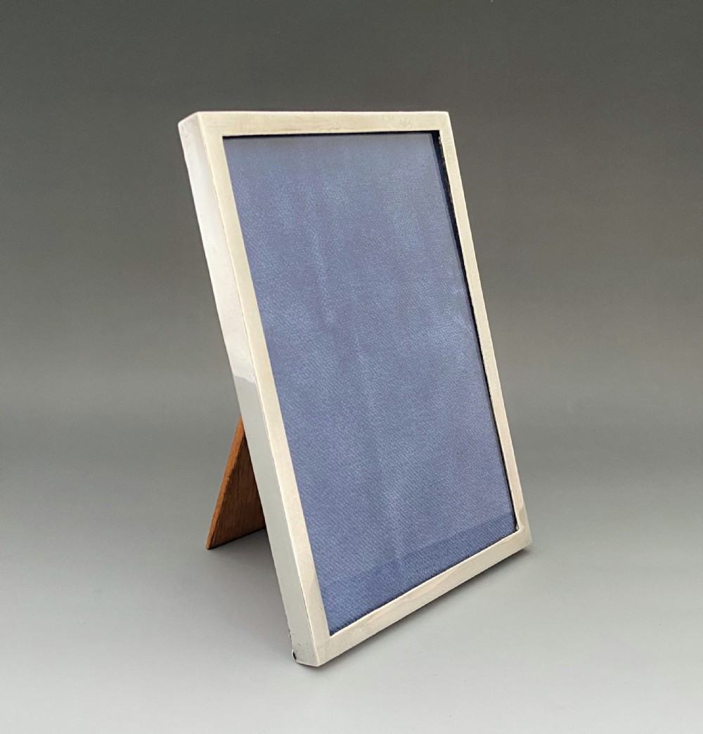 A lovely George V silver easel back photo frame