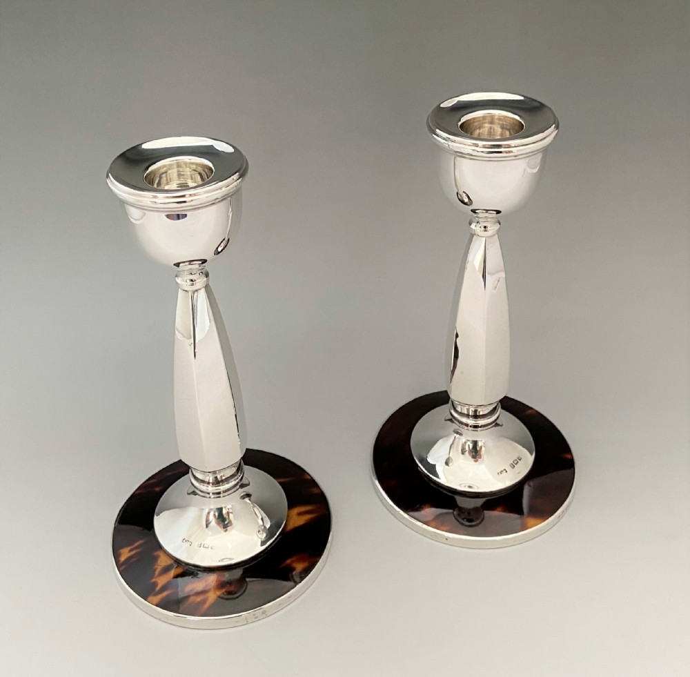 A rare pair of elegant silver & tortoiseshell candlesticks