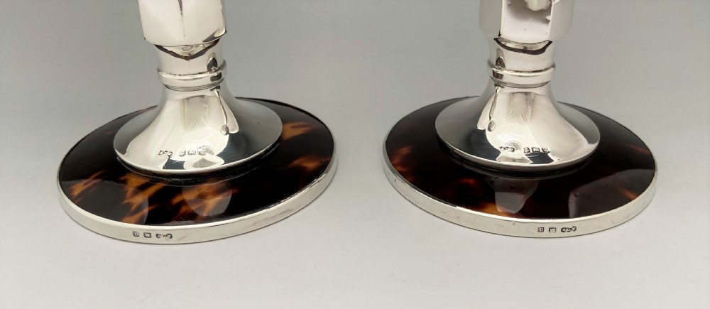 A rare pair of elegant silver & tortoiseshell candlesticks View VII