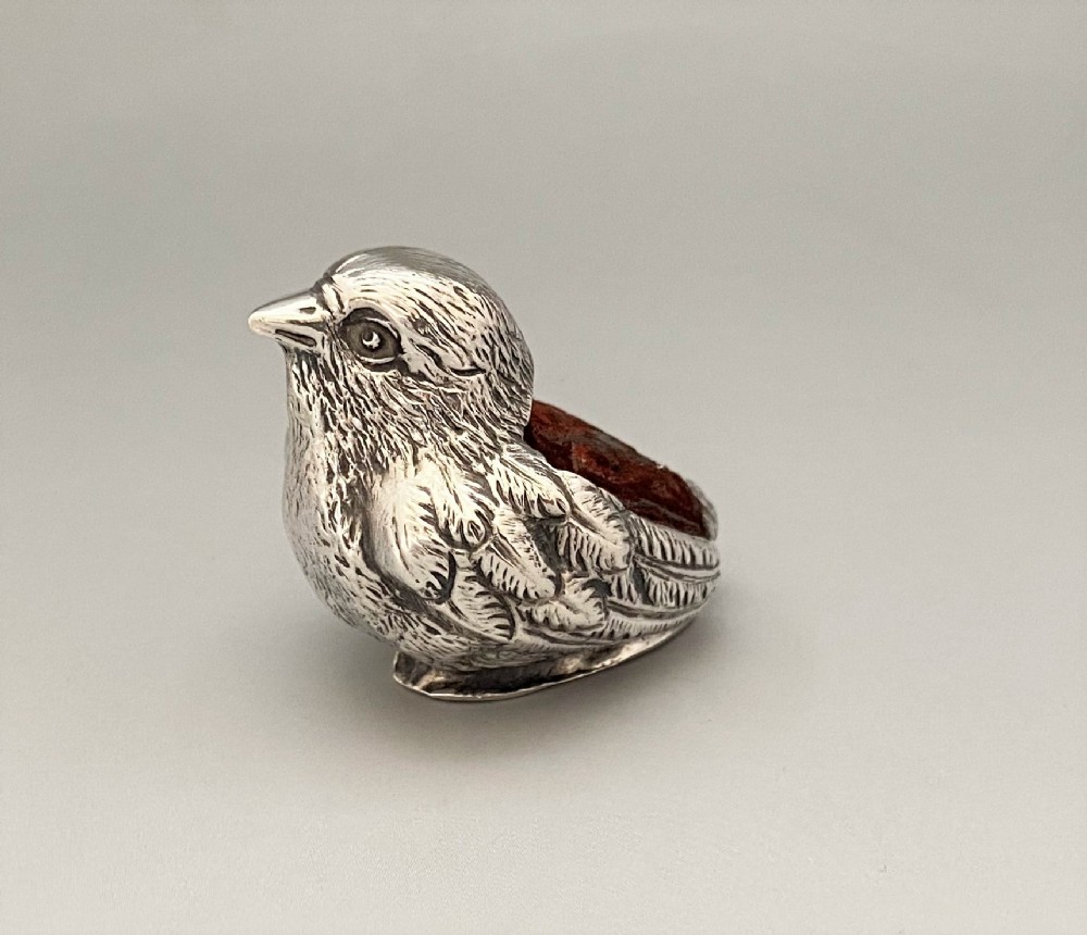 A sought after Sampson Morden Edwardian silver chick pin cushion