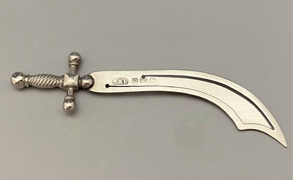 A rare Victorian silver 'scimitar' bookmark