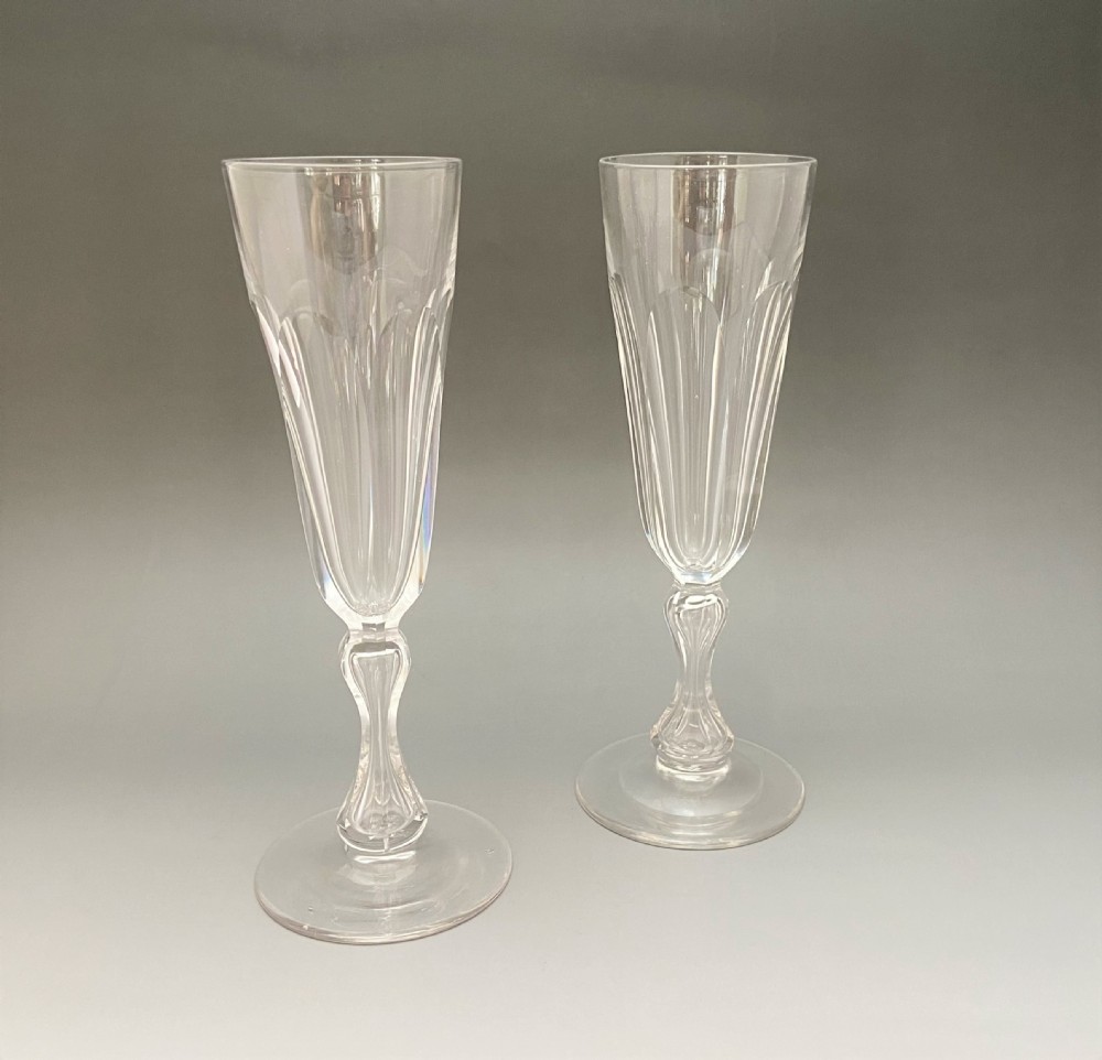 A fine pair of Victorian cut glass champagne flutes. View III