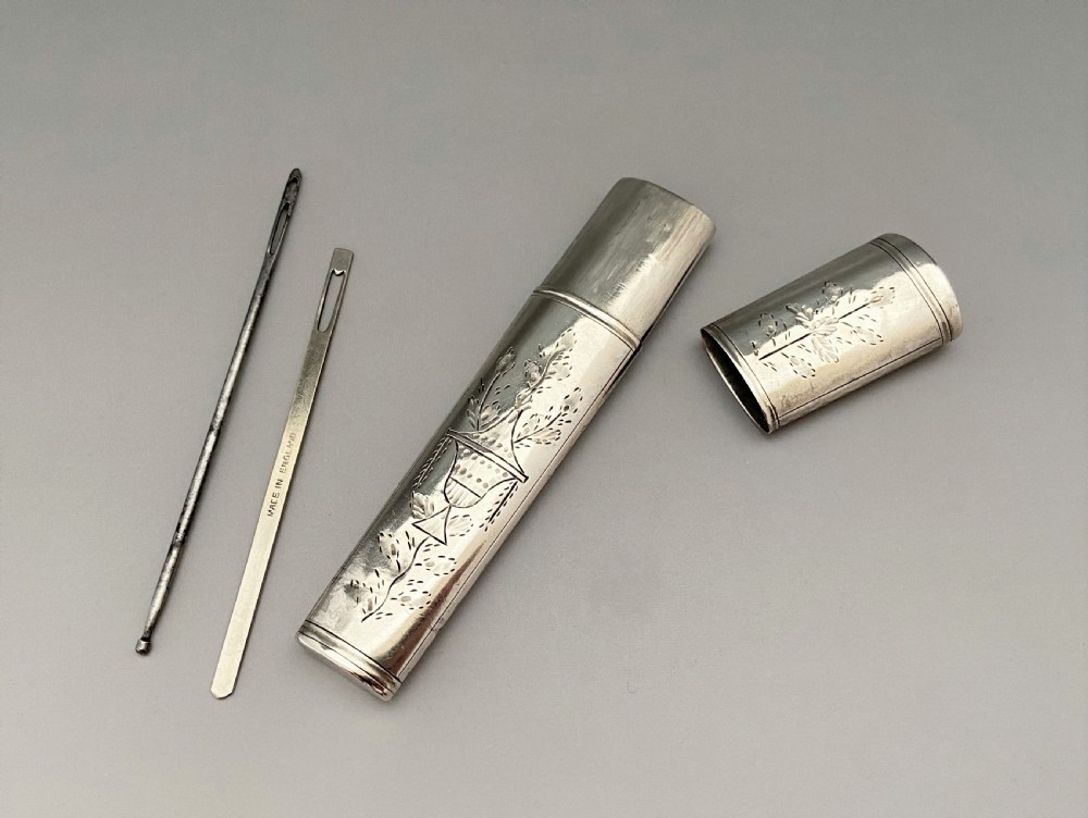 A lovely 18th Century silver needle case & tools