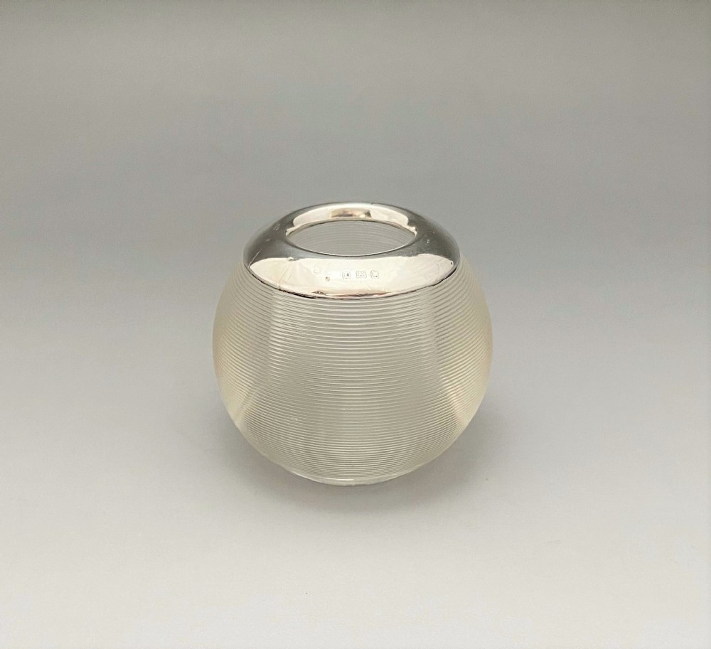 A fine silver mounted match striker