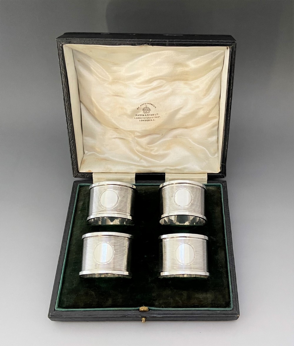 A handsome set of four boxed Chester silver napkin rings