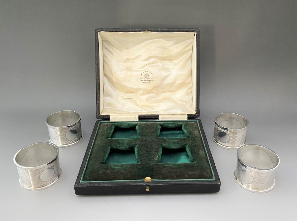 A handsome set of four boxed Chester silver napkin rings View V