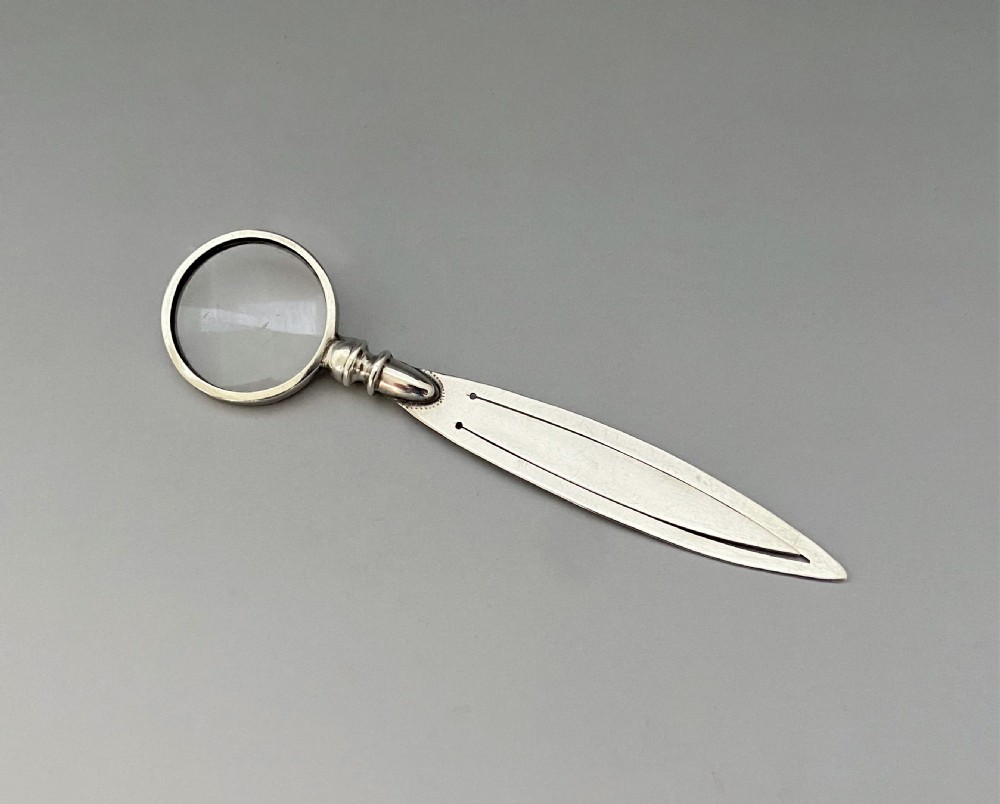 An unusual silver bookmark with magnifying glass terminal View IV