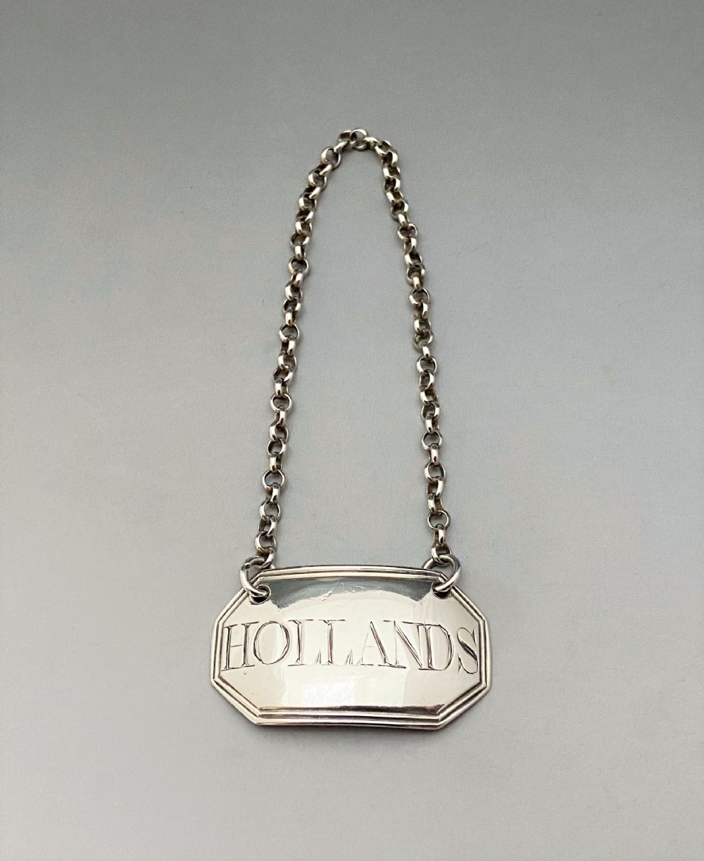 A desirable 18th Century silver ' Hollands' label