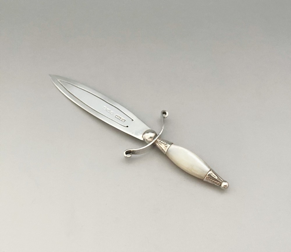 A large Victorian silver and mother-of-pearl novelty bookmark