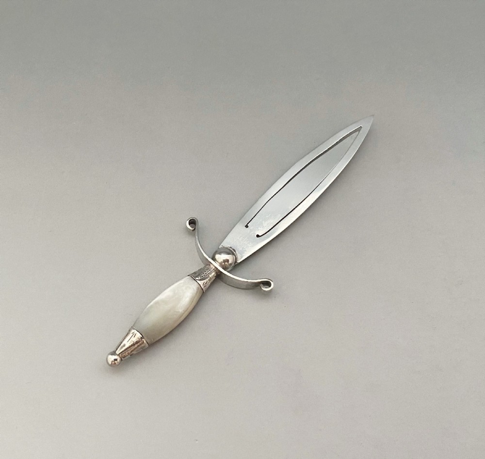 A large Victorian silver and mother-of-pearl novelty bookmark View IV