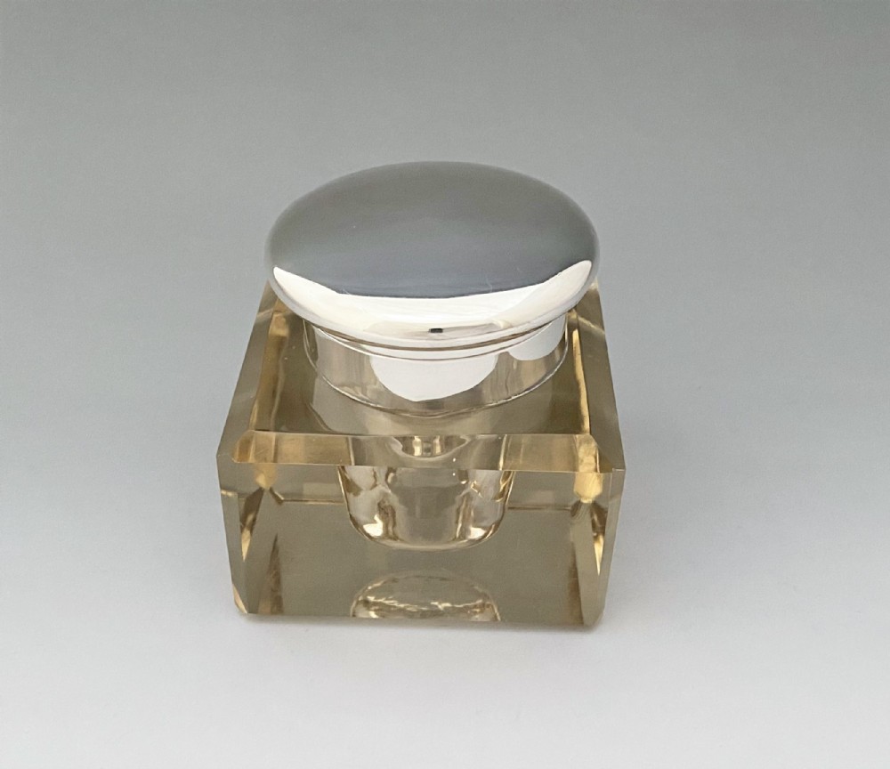 A handsome George V silver mounted inkwell