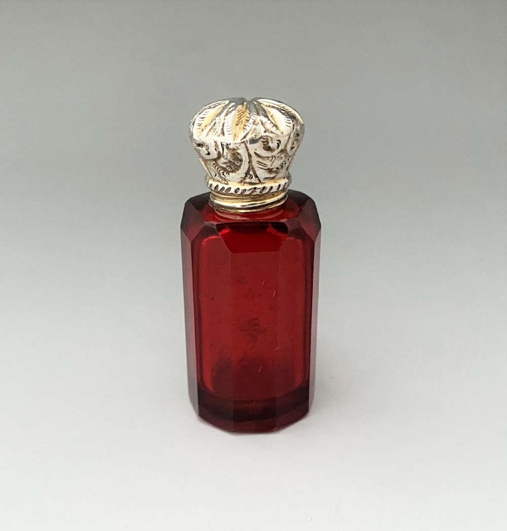 A Victorian silver mounted Ruby glass scent bottle