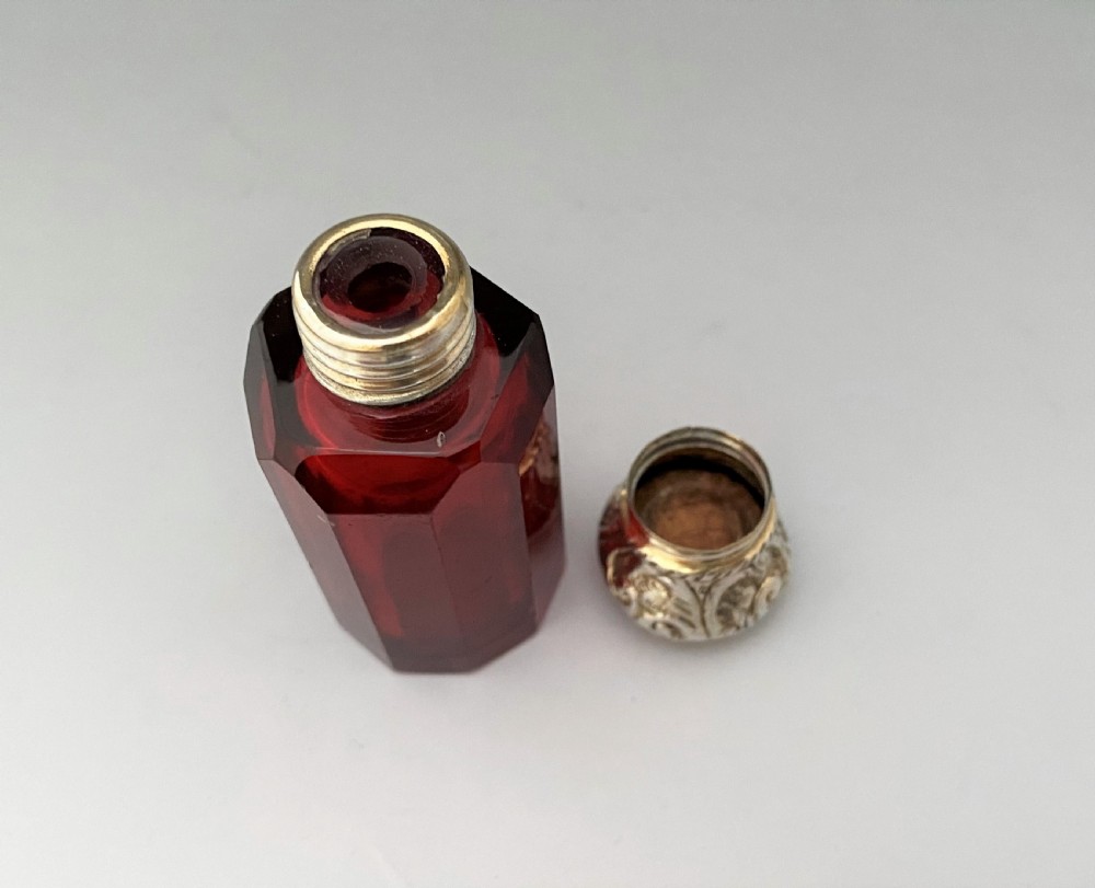 A Victorian silver mounted Ruby glass scent bottle View III