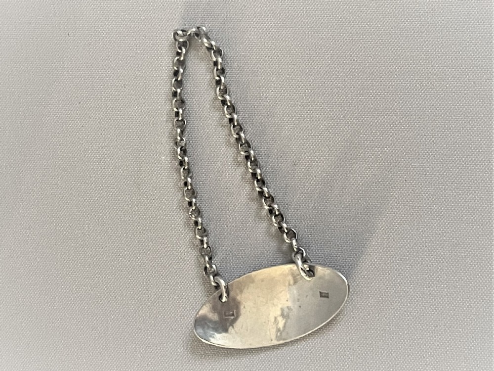 A charming Georgian silver 'Rum' label View III