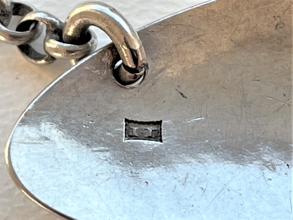 A charming Georgian silver 'Rum' label View V