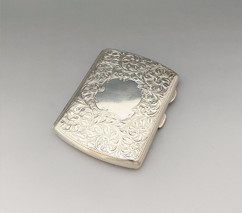 A handsome early George V silver cigarette case