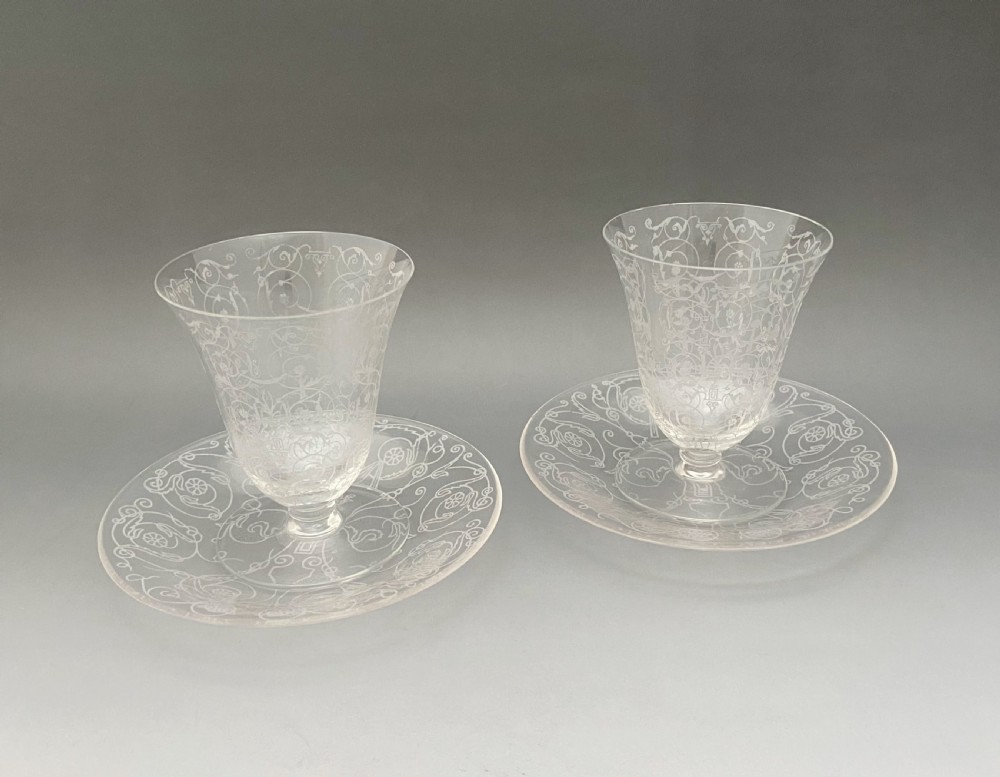 A fine pair of Baccarat glasses & saucers