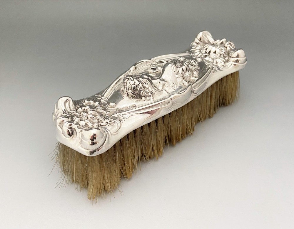 A fabulous Art Nouveau silver clothes brush View III