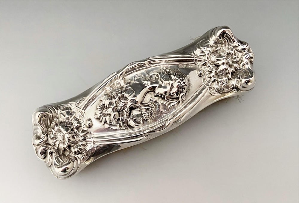 A fabulous Art Nouveau silver clothes brush View V